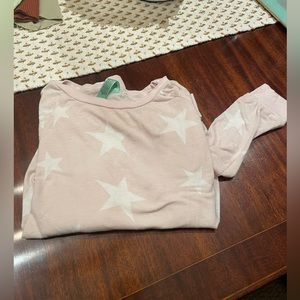 Woman’s pink and white star top